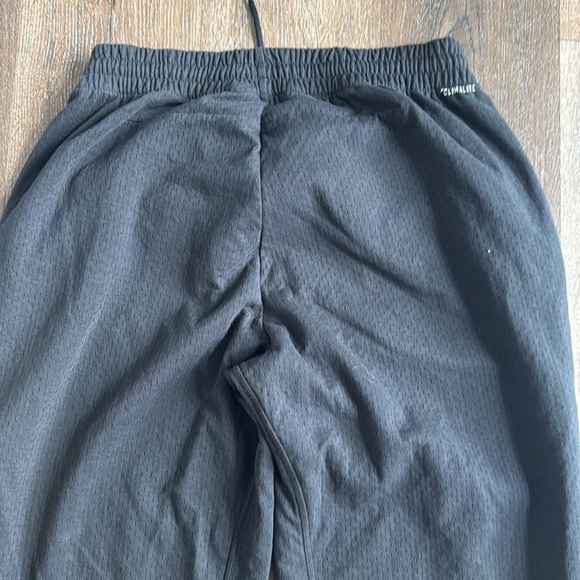 Adidas Pants.  Men’s size large.  Black, with zippers on the hem of the legs. - Picture 8 of 9